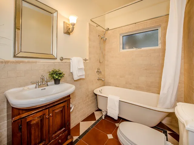 a kitchen with a sink and a refrigerator