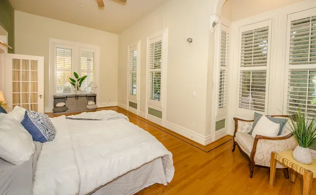 a bathroom with a tub and shower