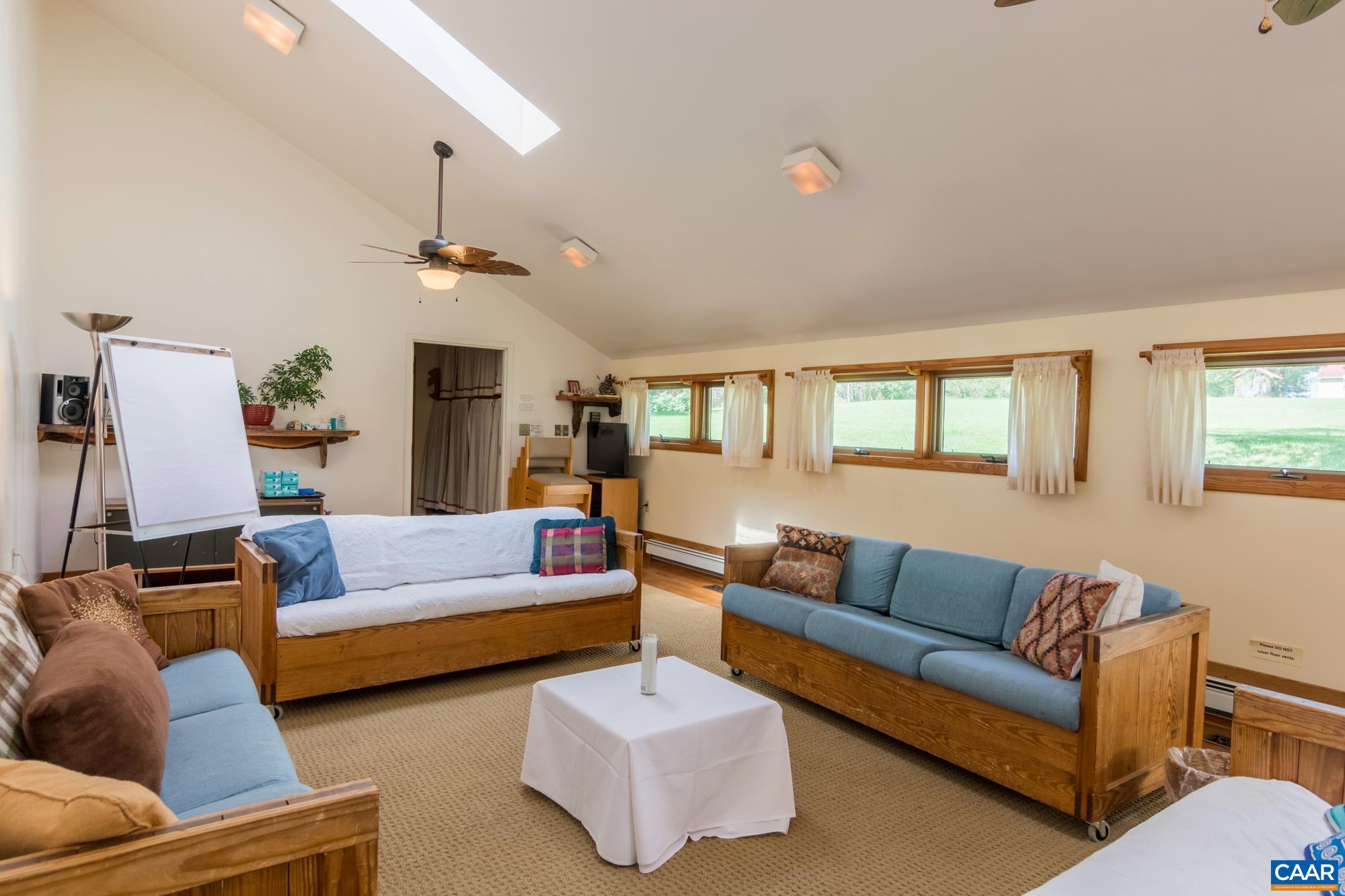 403 Pathwork Way Madison, VA 22727 - Photo 17 of 30 a living room with furniture and a couch