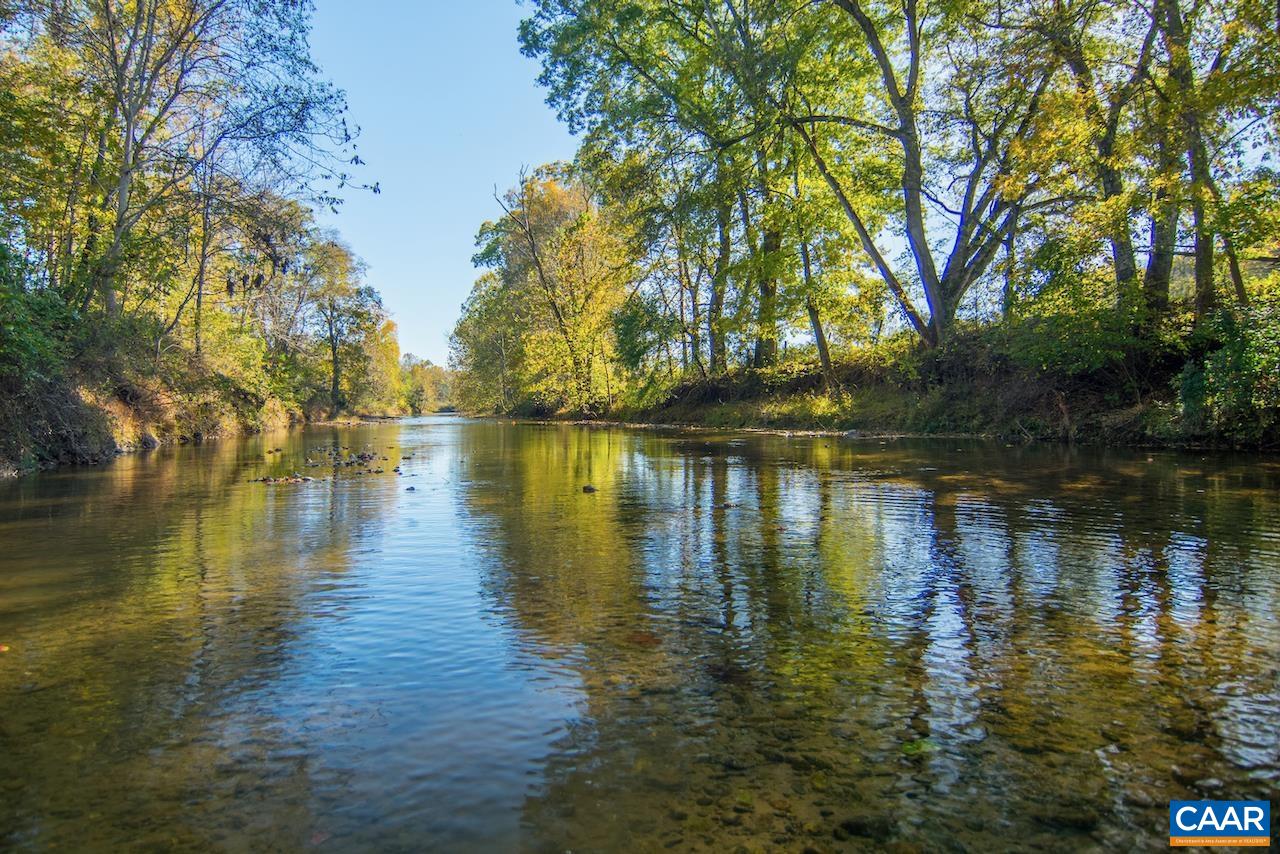 403 Pathwork Way Madison, VA 22727 - Photo 21 of 30 a body of water with a tree in the background