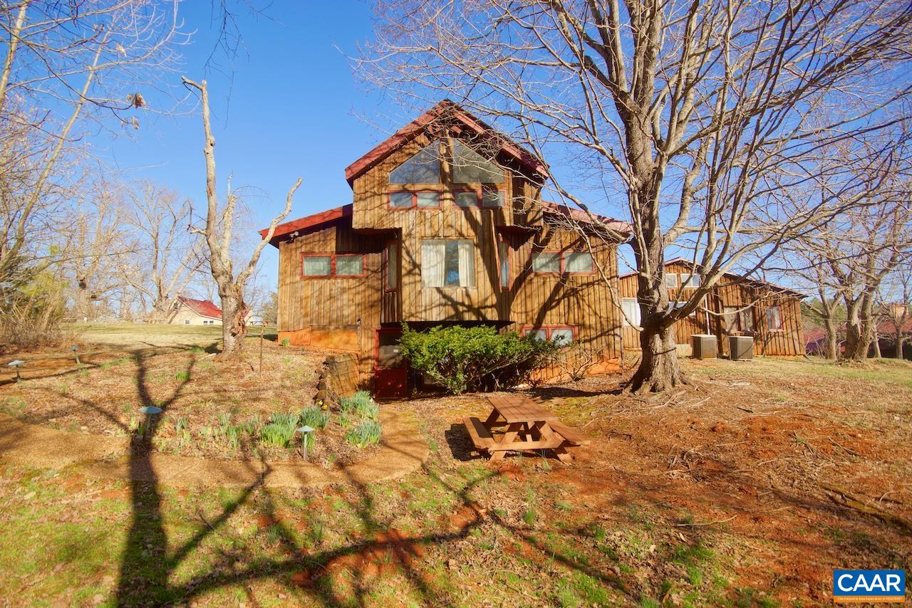 403 Pathwork Way Madison, VA 22727 - Photo 6 of 30 a backyard of a house with large trees