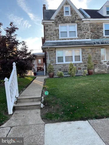 front view of house with a yard