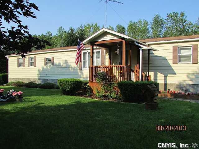9225 Bonta Bridge Road Brutus, NY 13080 - Photo 1 of 1 Exterior Front Beautiful park like setting