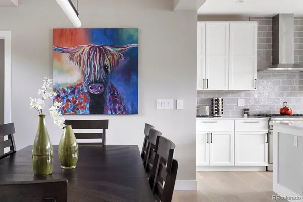 a room with furniture and wooden floor