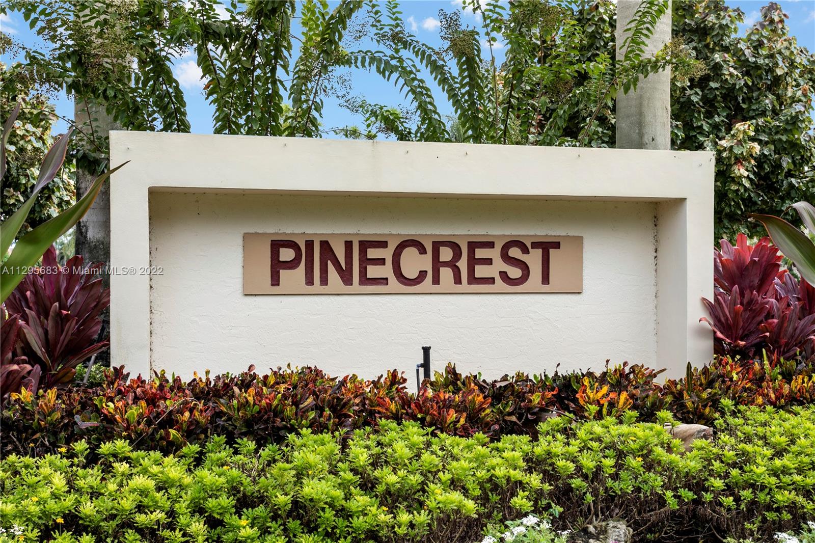 101 Pinecrest Circle, Unit E Jupiter, FL 33458 - Photo 20 of 20 a view of outdoor space with garden and flowers
