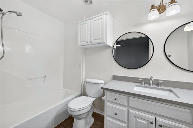 a view of a livingroom with wooden floor