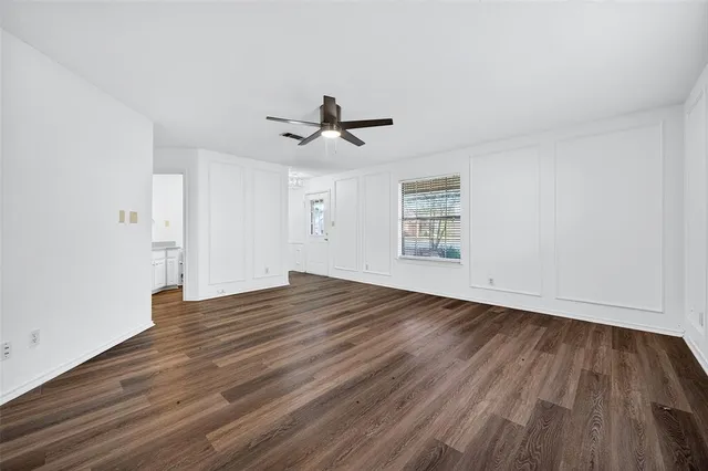 a view of cabinets and wooden floor