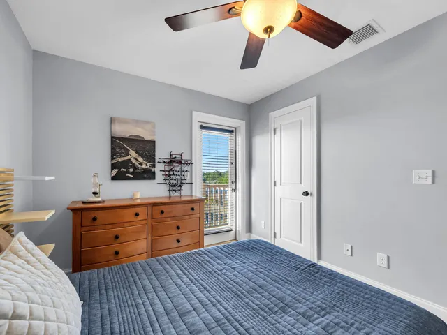 a room with a dresser and a dresser