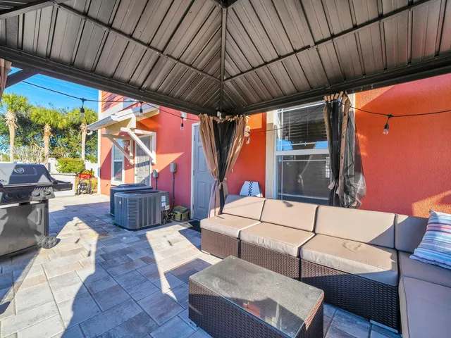 a outdoor living space with furniture