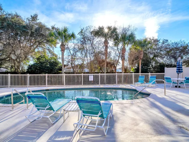 a view of a chairs on the deck