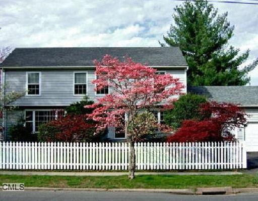 a front view of a house having yard