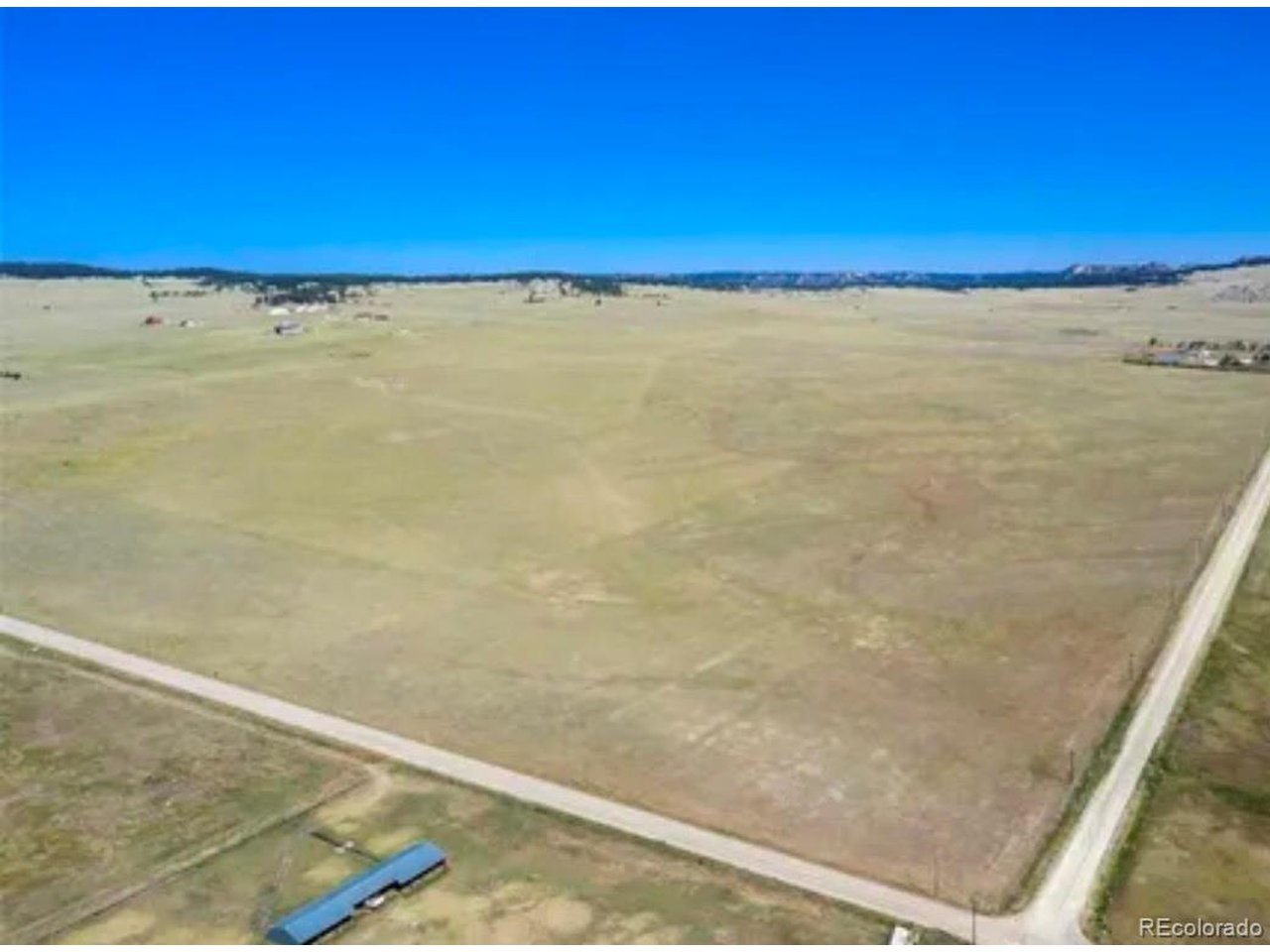 7 McClelland Road Calhan, CO 80808 - Photo 6 of 9 a view of yard with ocean view