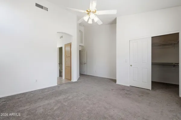an aerial view of a house with a swimming pool