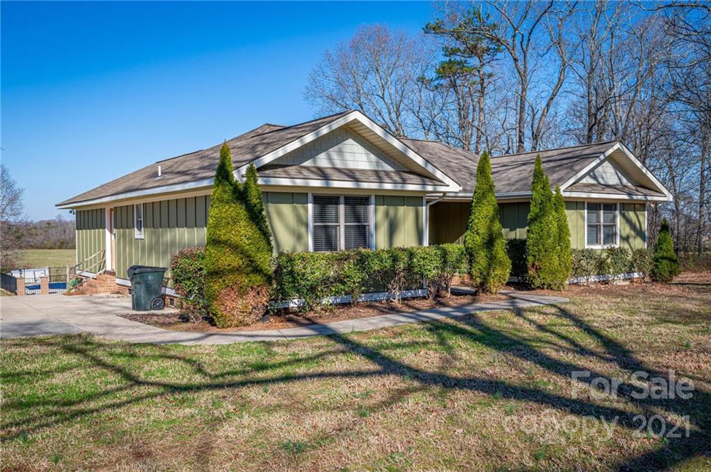 6974 Lackey Road Vale, NC 28168 - Photo 20 of 40 a front view of house with yard and outdoor seating