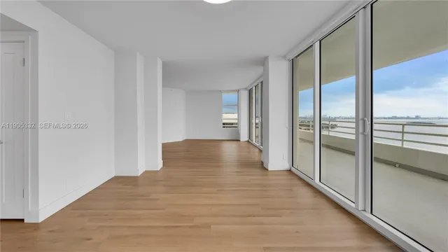 a kitchen with refrigerator and refrigerator