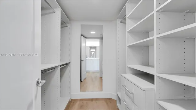 a view of an empty walk in closet