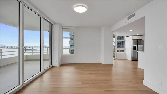 a view of an empty room and window