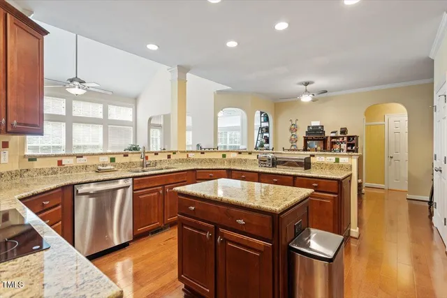 a bedroom with a bed couch and window
