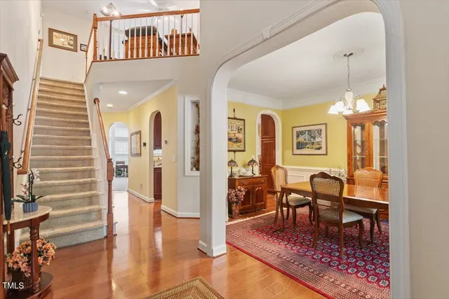 a view of a livingroom with furniture and wooden floor