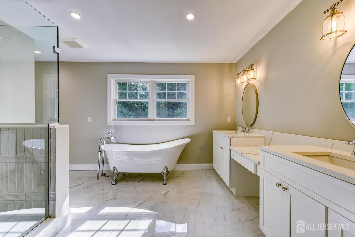 923 Iron Bridge Road Asbury, NJ 08802 - Photo 15 of 41 a spacious bathroom with a bathtub sink and toilet