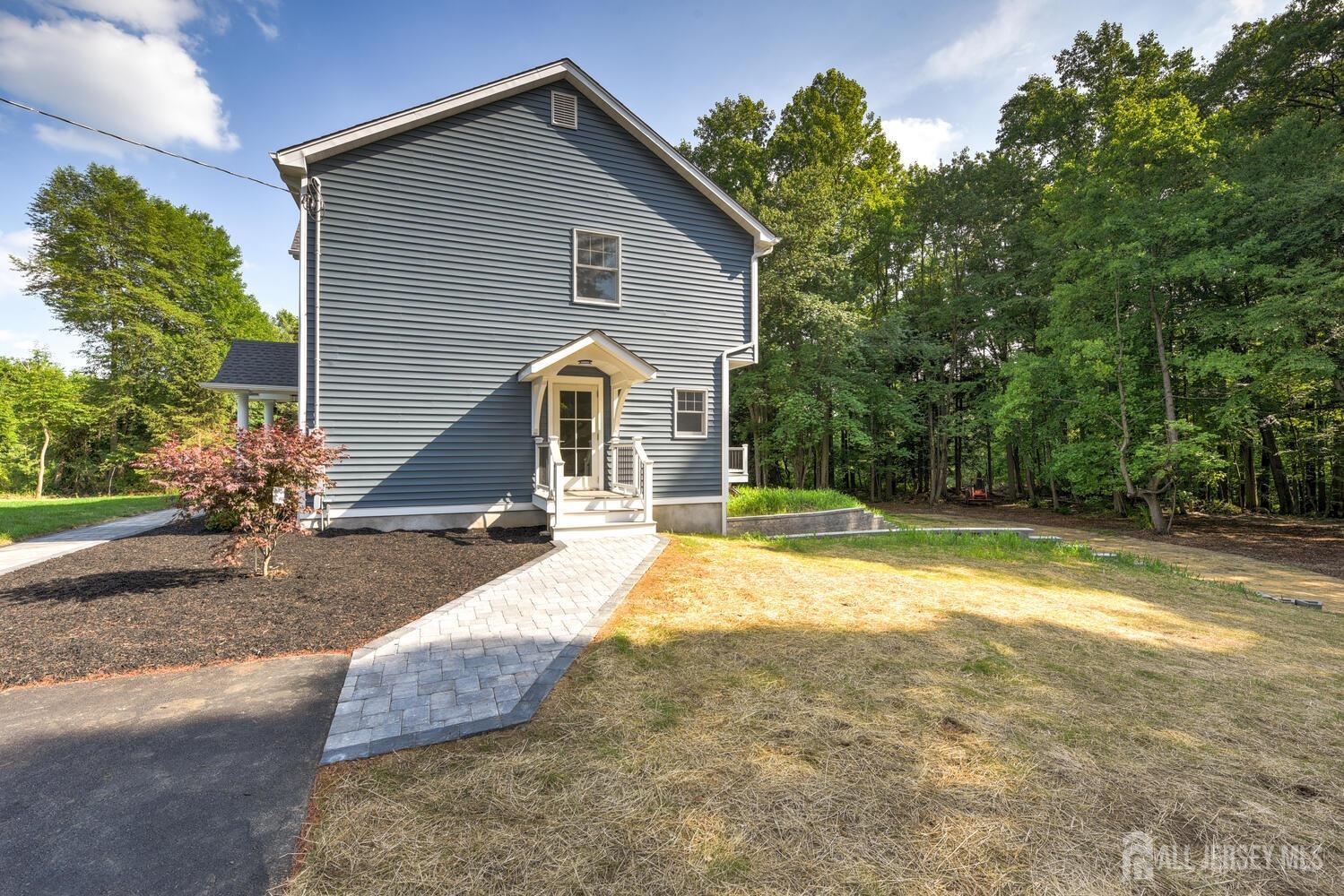 923 Iron Bridge Road Asbury, NJ 08802 - Photo 7 of 41 a view of a house with backyard and trees