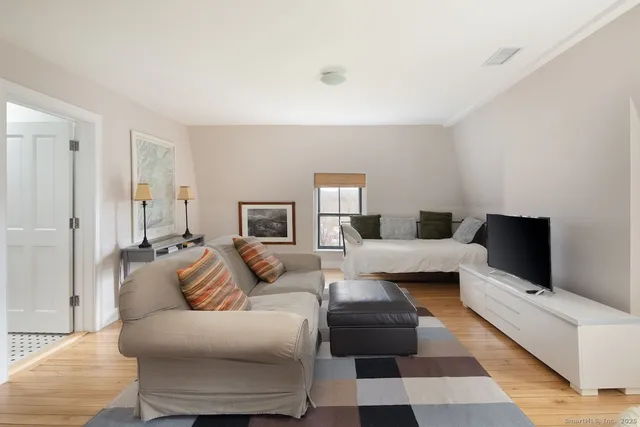 a living room with furniture and a couch