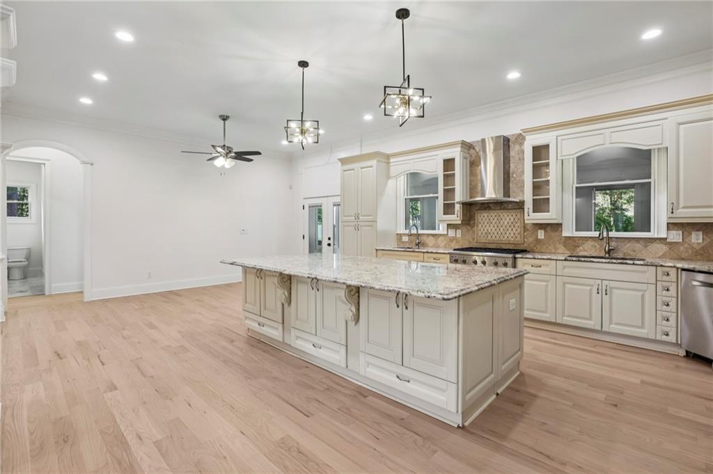 3170 Lavista Road Decatur, GA 30033 - Photo 13 of 29 a kitchen with stainless steel appliances granite countertop a sink stove and refrigerator