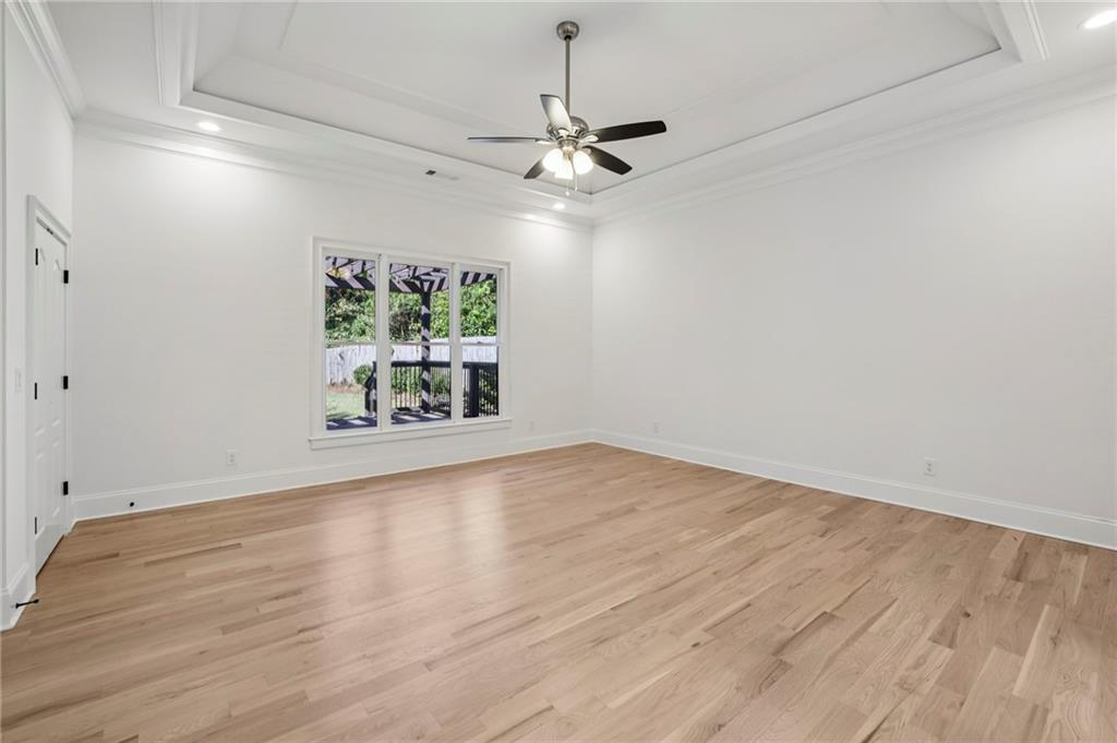 3170 Lavista Road Decatur, GA 30033 - Photo 14 of 29 wooden floor in an empty room with a window