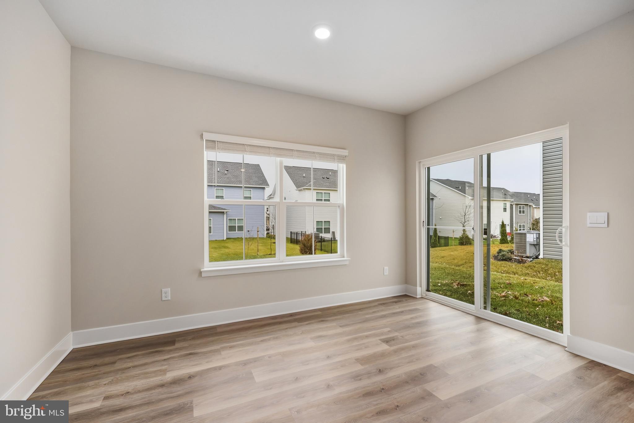 226 Munsee Winchester, VA 22603 - Photo 12 of 33 an empty room with wooden floor and windows
