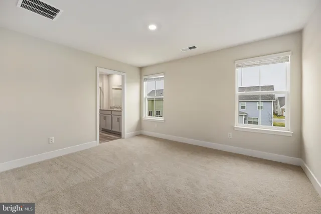 an empty room with windows