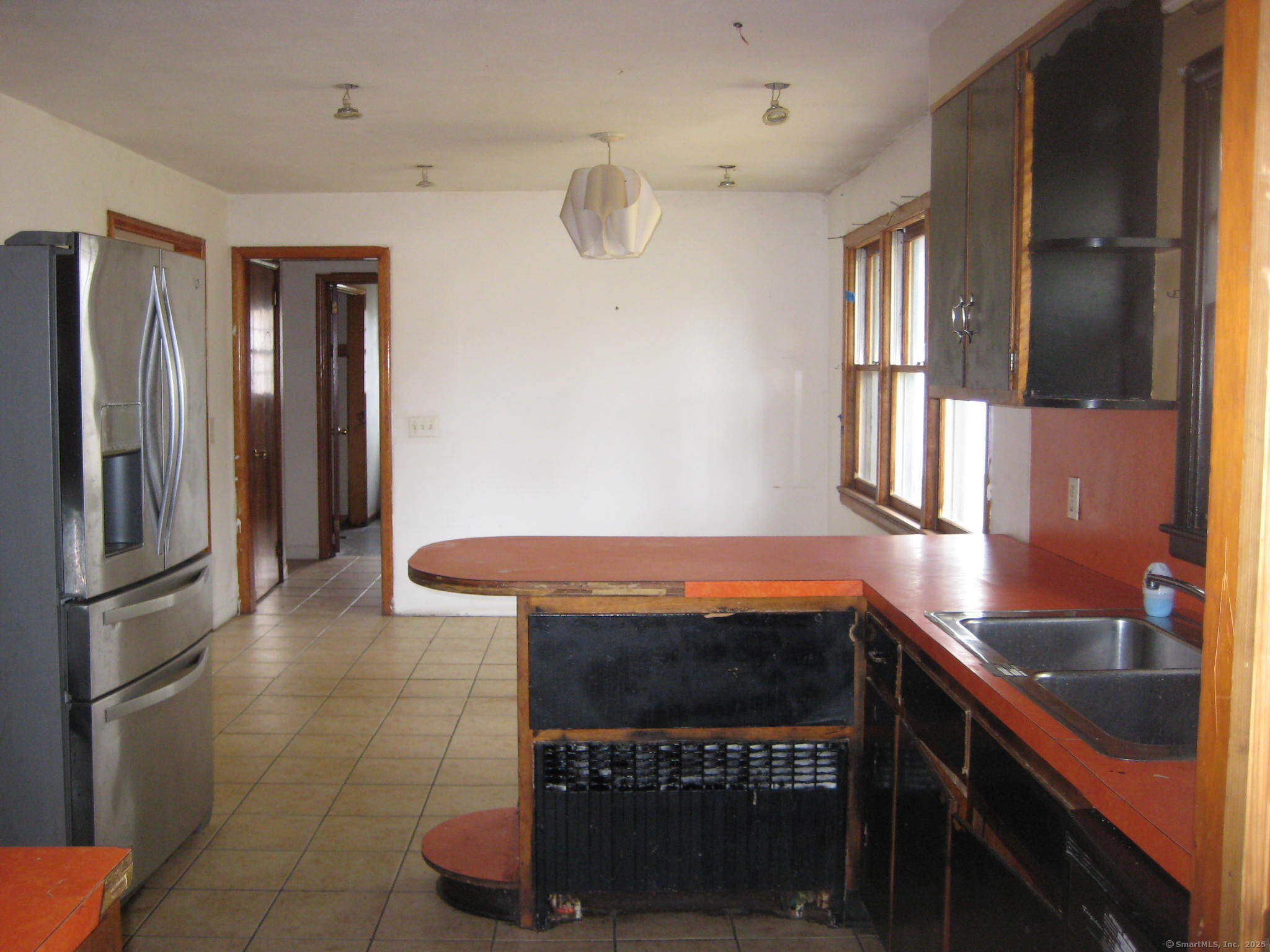347 Farm Hill Road Middletown, CT 06457 - Photo 9 of 15 a kitchen with stainless steel appliances granite countertop a refrigerator and a sink