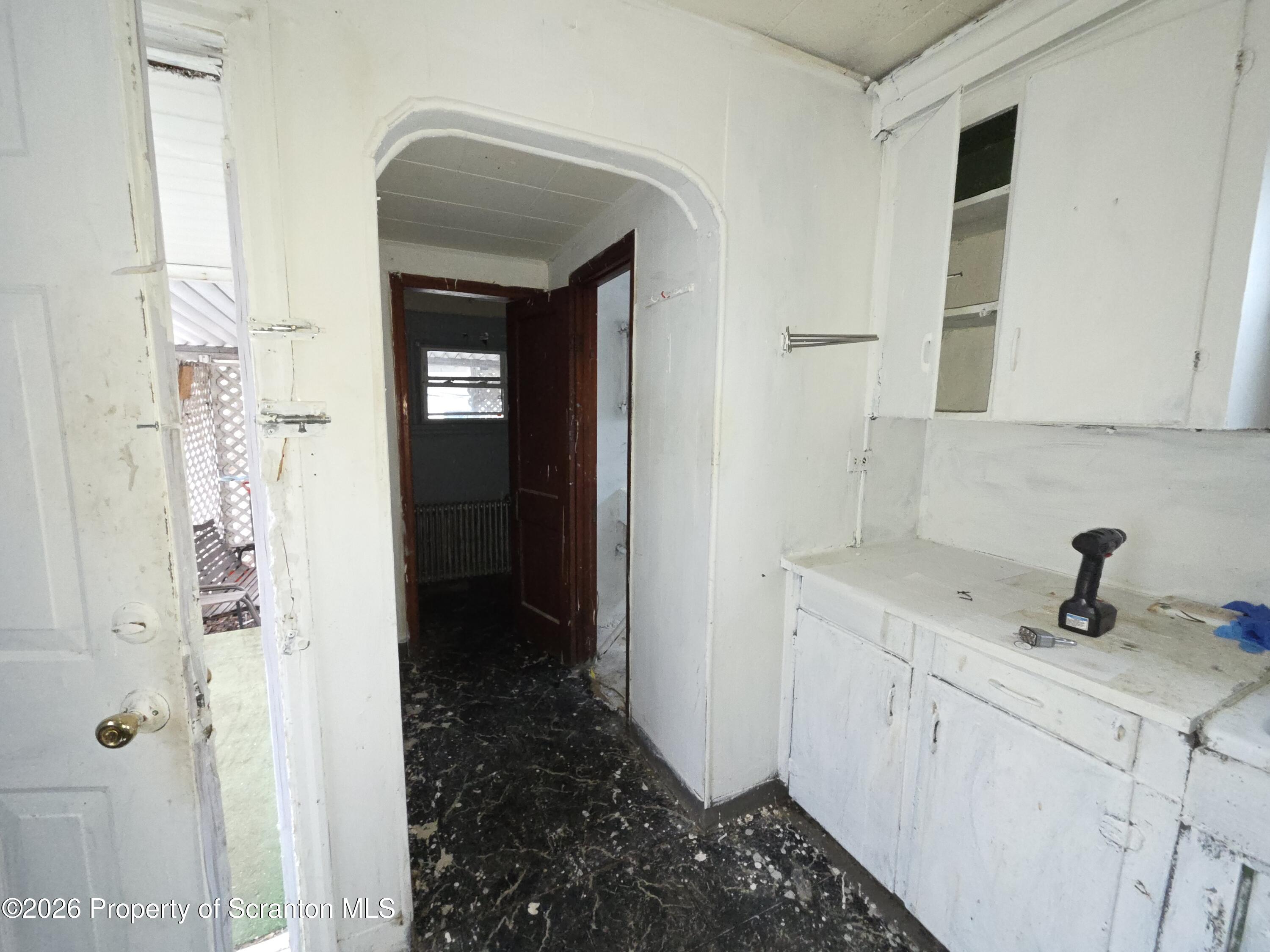 521 Albion Street Scranton, PA 18508 - Photo 14 of 22 a en suite bathroom with a sink and a mirror