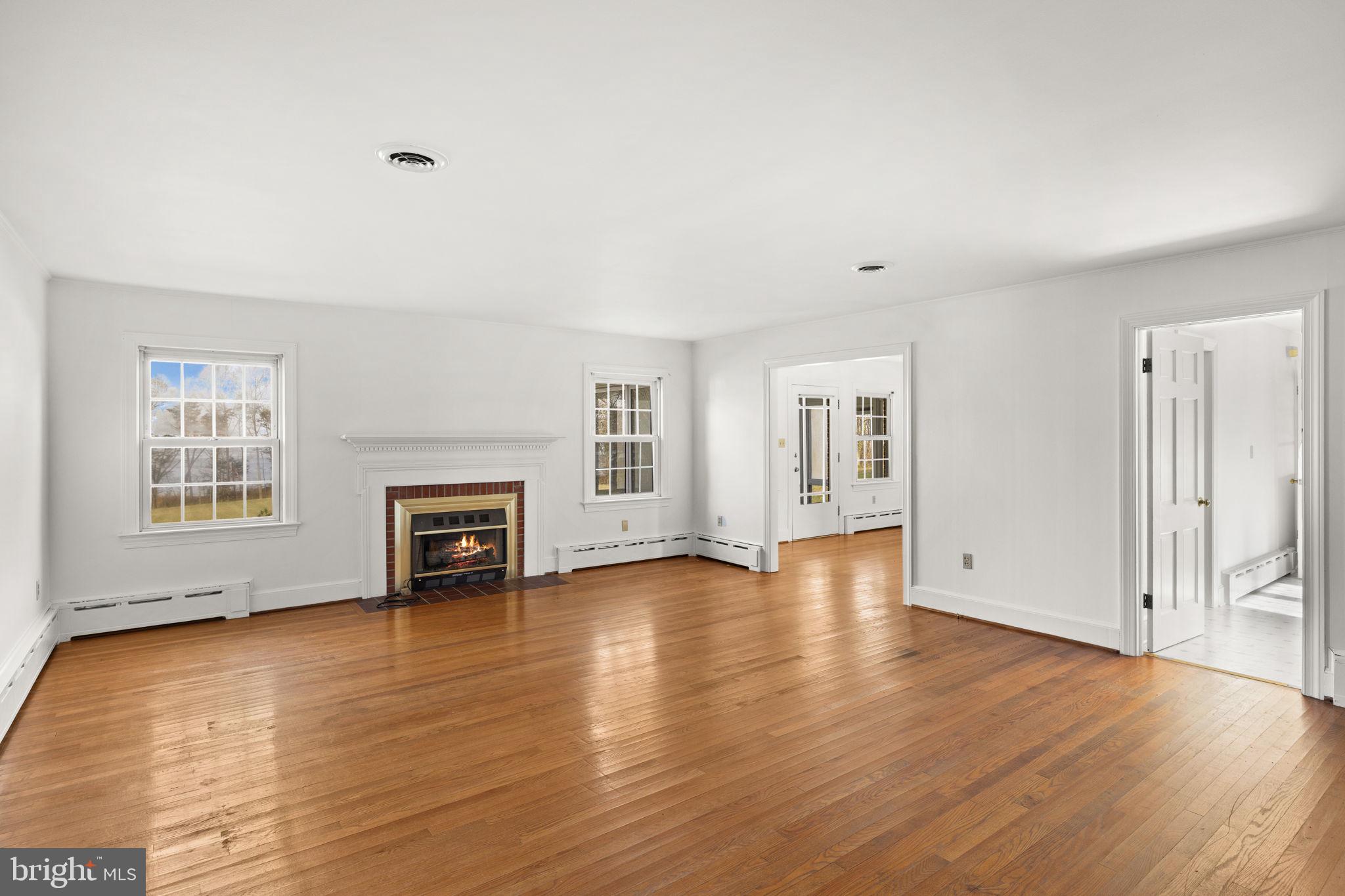 1324 Woodstock Road King George, VA 22485 - Photo 4 of 51 Cozy Fireside Living Room (fire virtually staged)