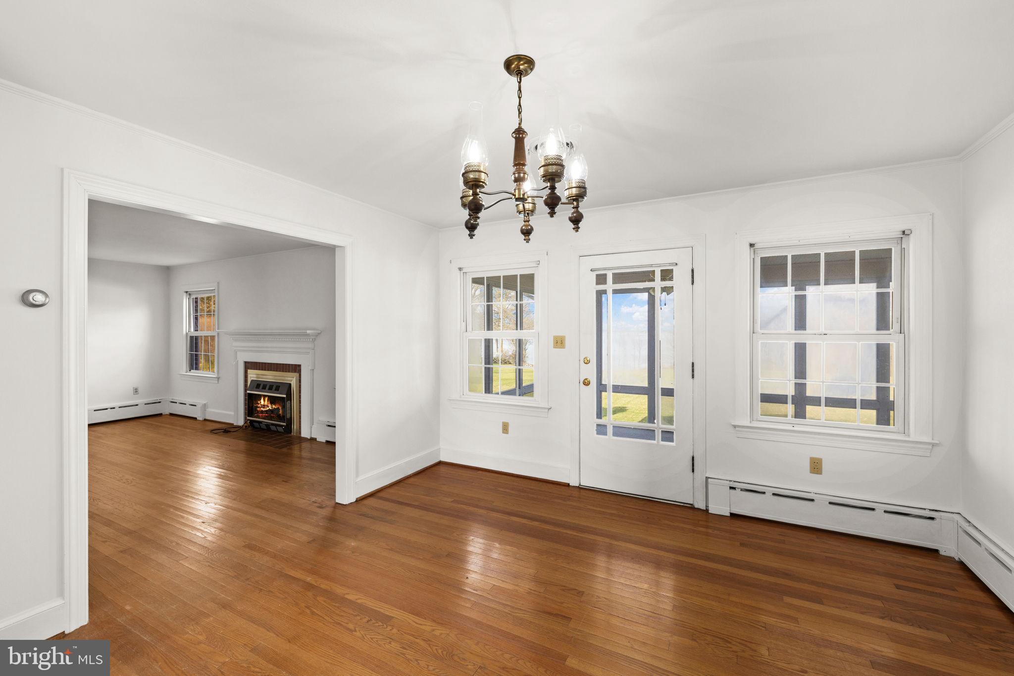 1324 Woodstock Road King George, VA 22485 - Photo 7 of 51 Formal Dining Room w/ Access to Sun Porch