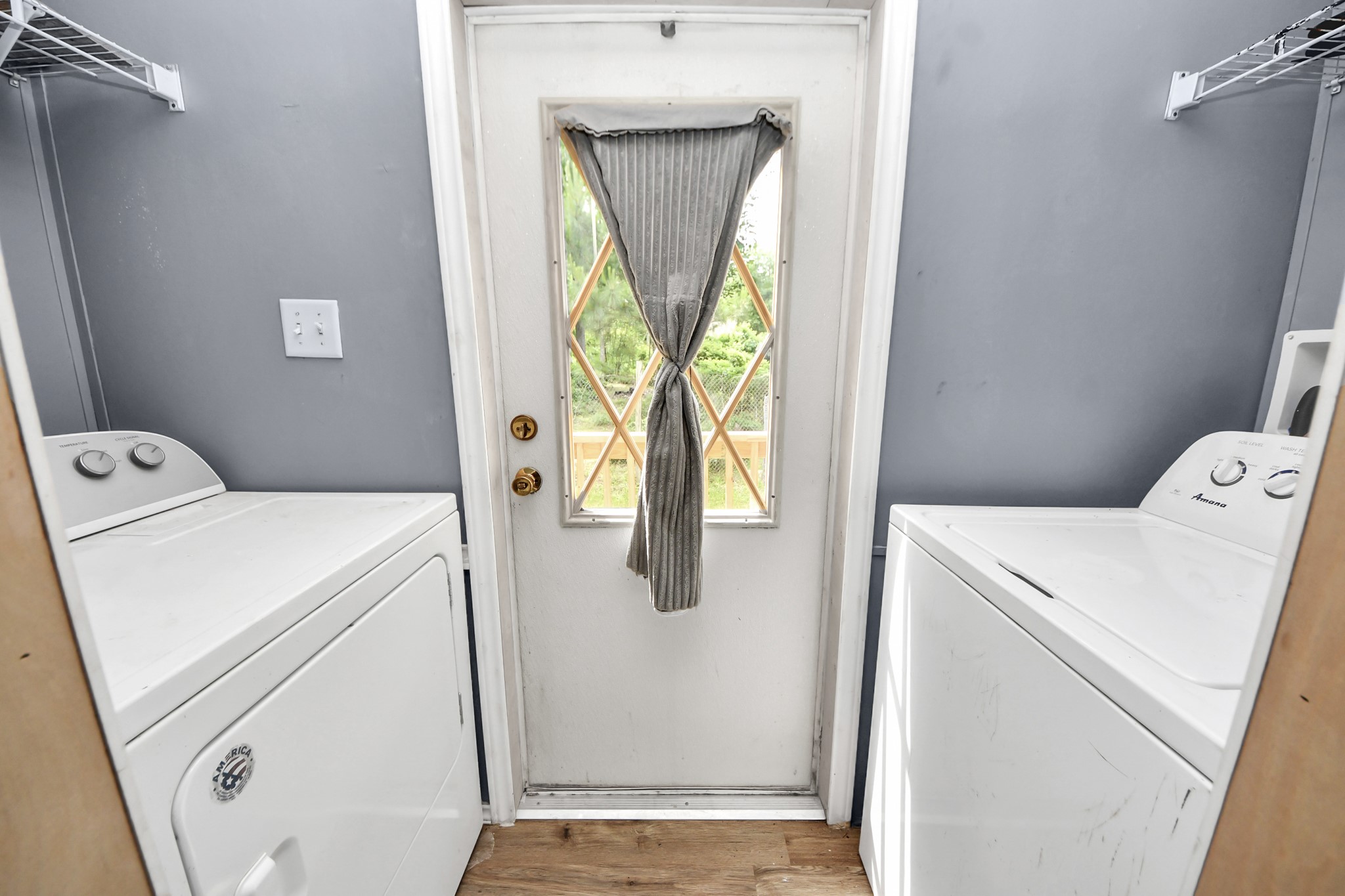 25932 Thatcham New Caney, TX 77357 - Photo 12 of 44 a utility room with dryer and washer
