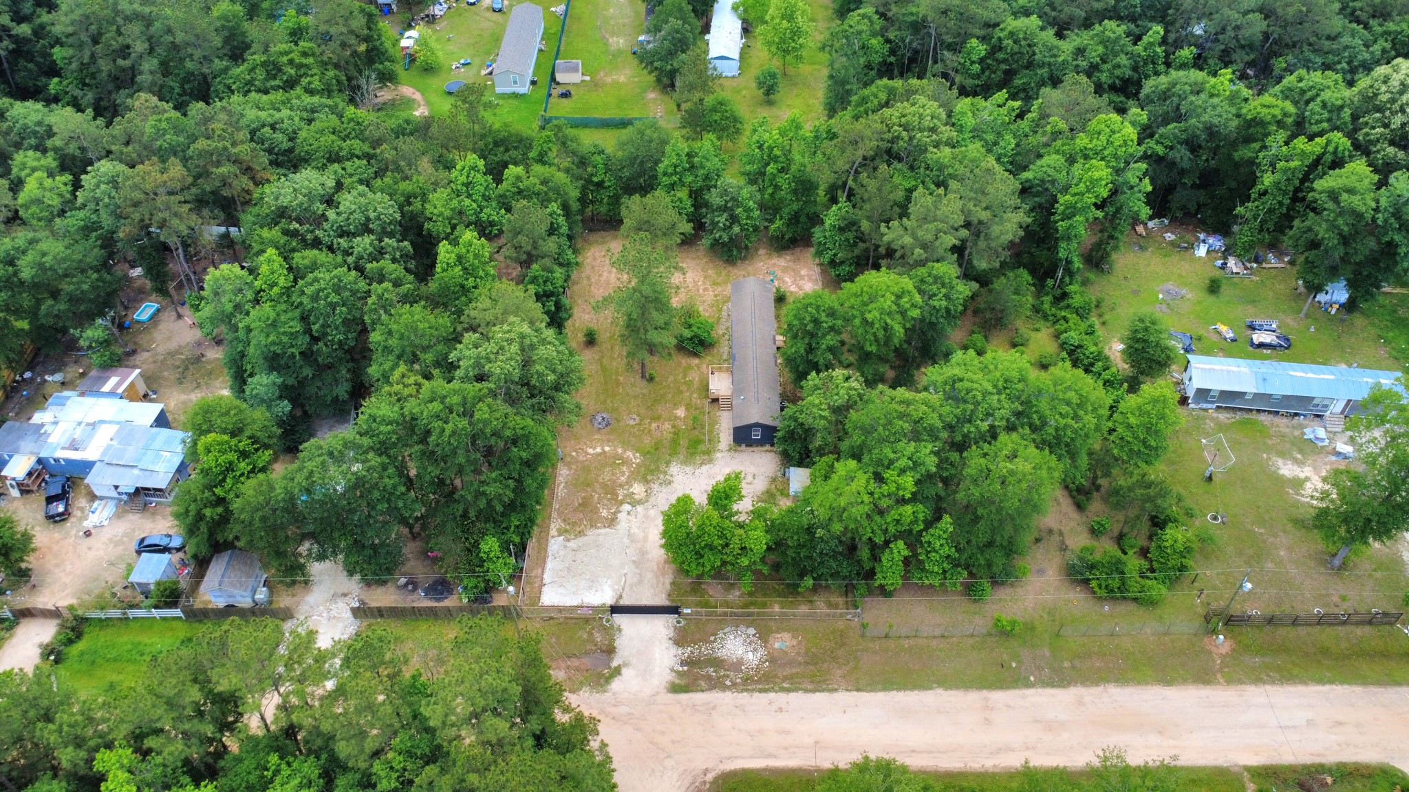 25932 Thatcham New Caney, TX 77357 - Photo 39 of 44 an aerial view of a house with a yard