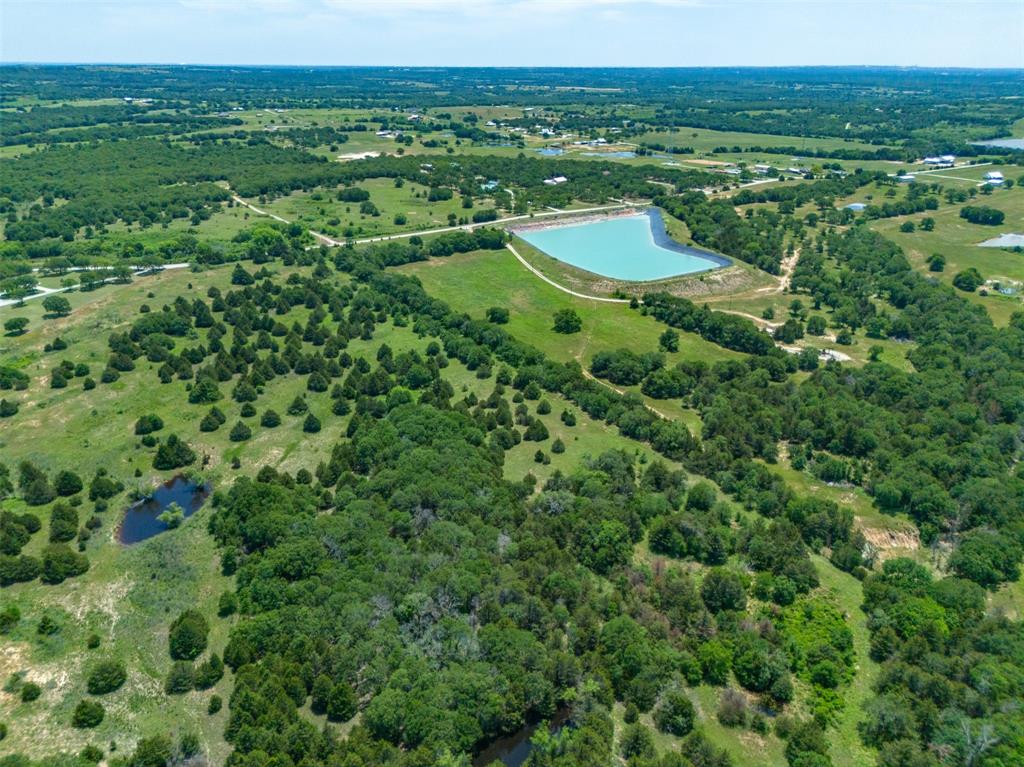 Tbd Tbd Cr-2690 Road Alvord, TX 76225 - Photo 3 of 34 a view of a city with lush green forest