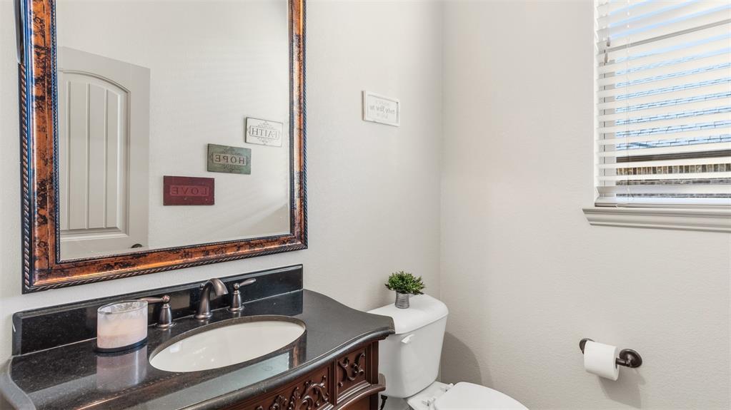 509 Alice Lane Fate, TX 75189 - Photo 20 of 36 Half bath for entertaining guests