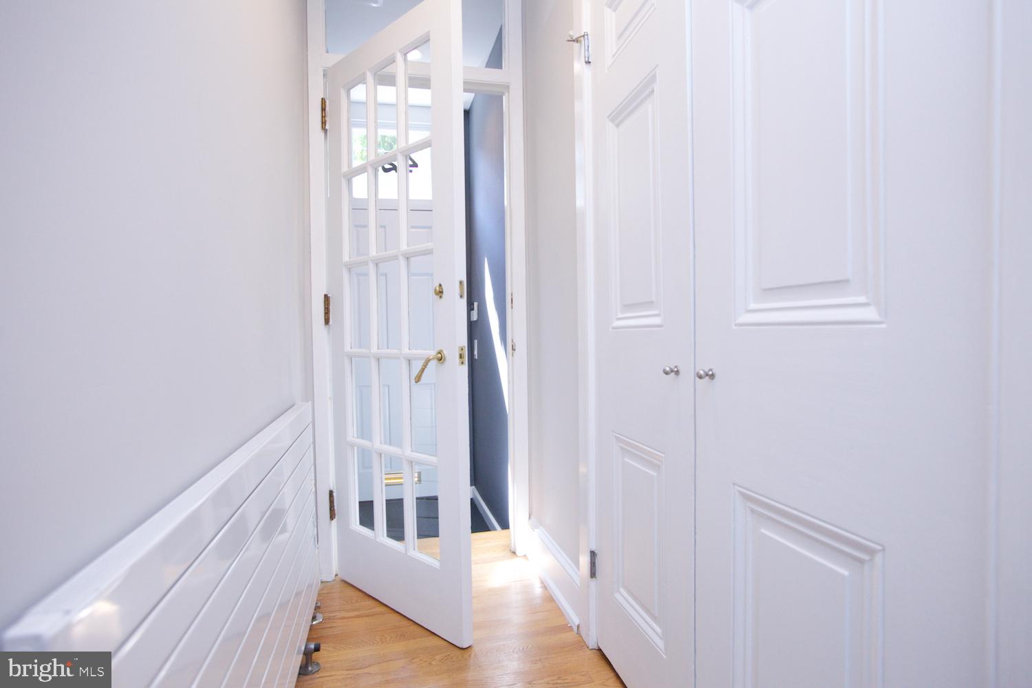 421 South 20th Street Philadelphia, PA 19146 - Photo 16 of 40 a view of a hallway with wooden floor and staircase