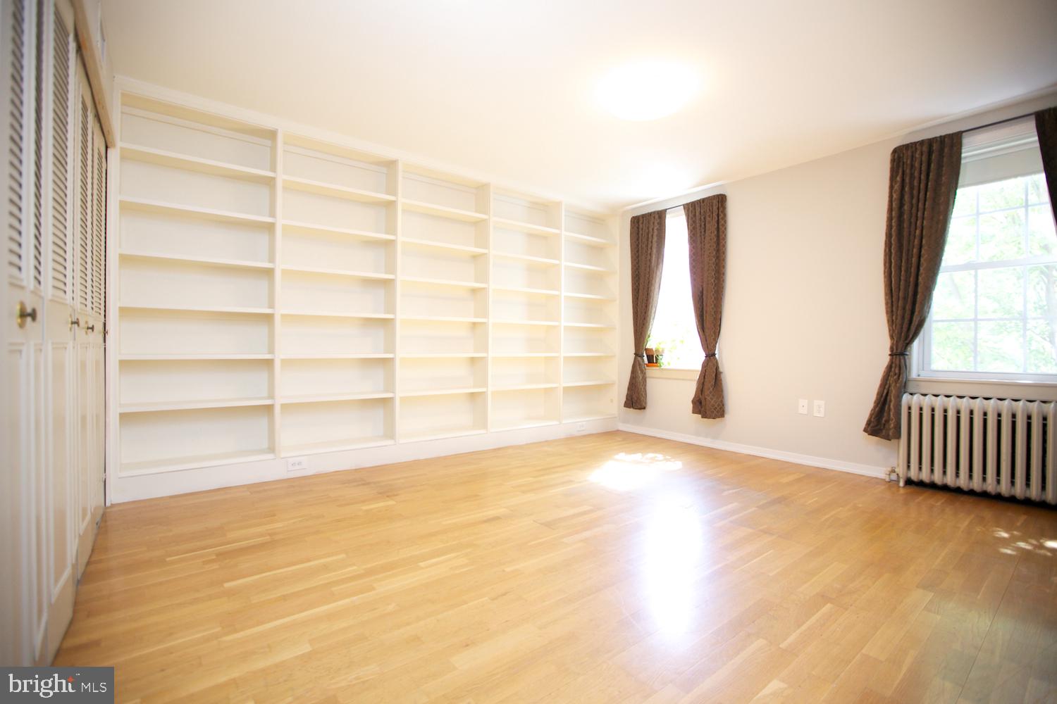 421 South 20th Street Philadelphia, PA 19146 - Photo 23 of 40 a view of an empty room with wooden floor and a window