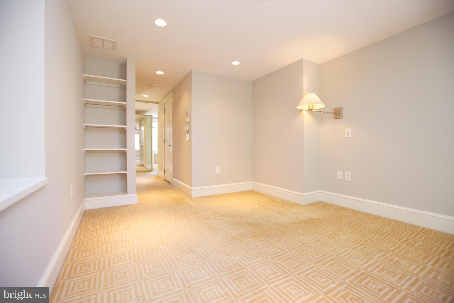 421 South 20th Street Philadelphia, PA 19146 - Photo 29 of 40 a view of empty room with a fireplace