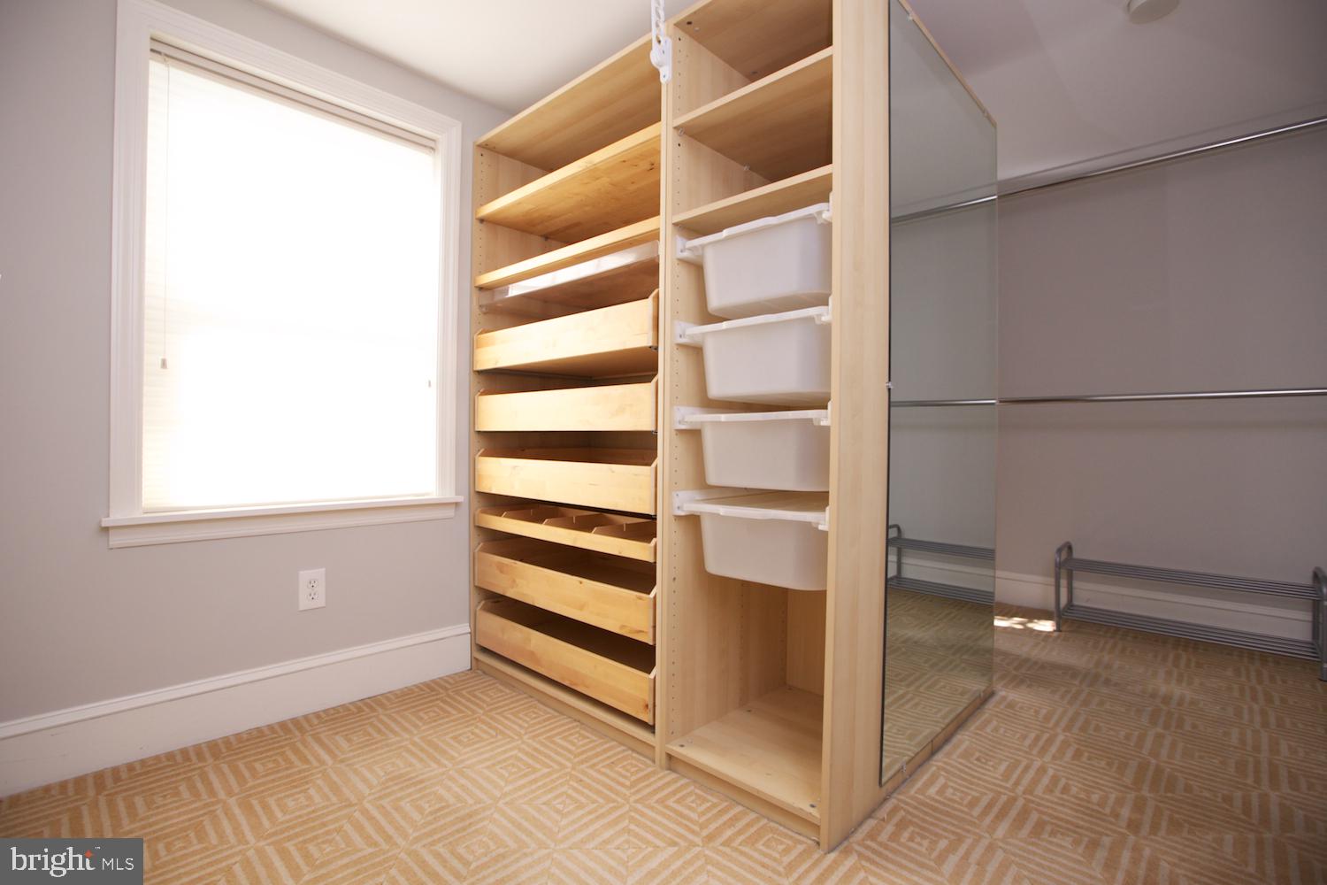 421 South 20th Street Philadelphia, PA 19146 - Photo 32 of 40 a view of walk in closet with empty racks