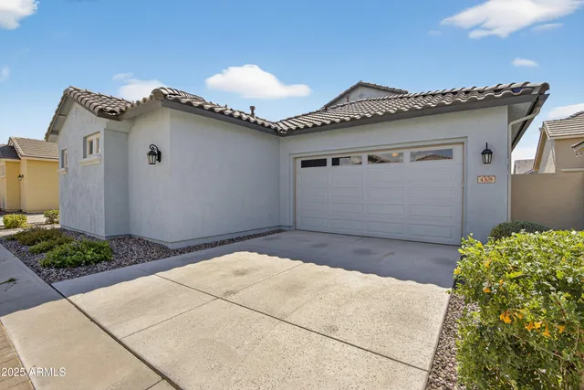 a bathroom with a tub and shower