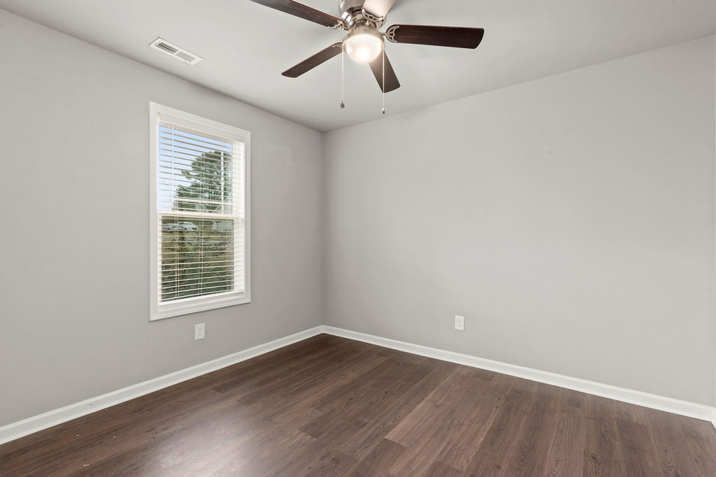 624 Roberts Road Willow Spring, NC 27592 - Photo 17 of 30 Third Bedroom with Neutral Paint Colors Throughout the Home
