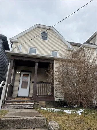 a view of a house with a balcony