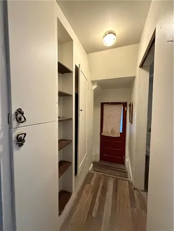 a kitchen with stainless steel appliances granite countertop a sink dishwasher stove and refrigerator