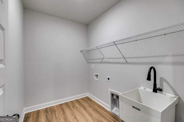 a bathroom with a sink and vanity