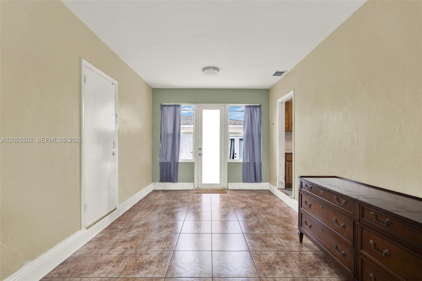 5701 Southwest 50th Terrace Miami, FL 33155 - Photo 12 of 46 a view of a room with front door