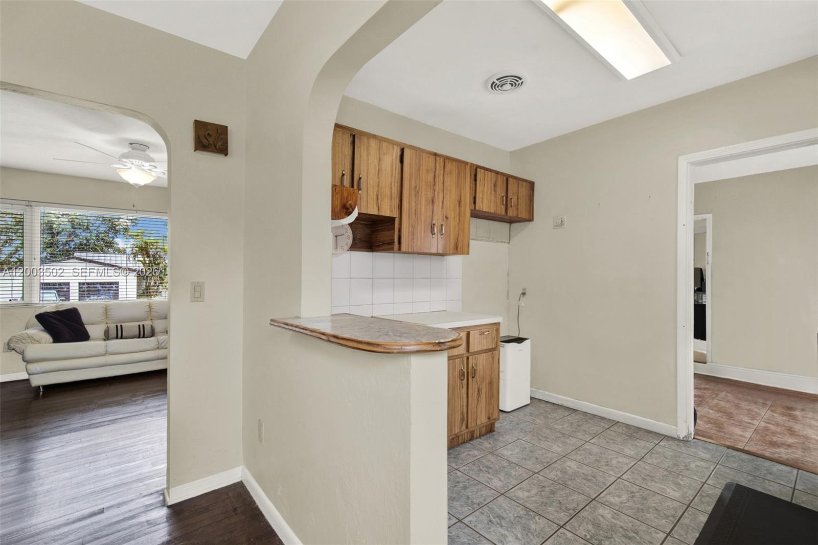 5701 Southwest 50th Terrace Miami, FL 33155 - Photo 14 of 46 a view of kitchen with stainless steel appliances granite countertop a stove and a refrigerator