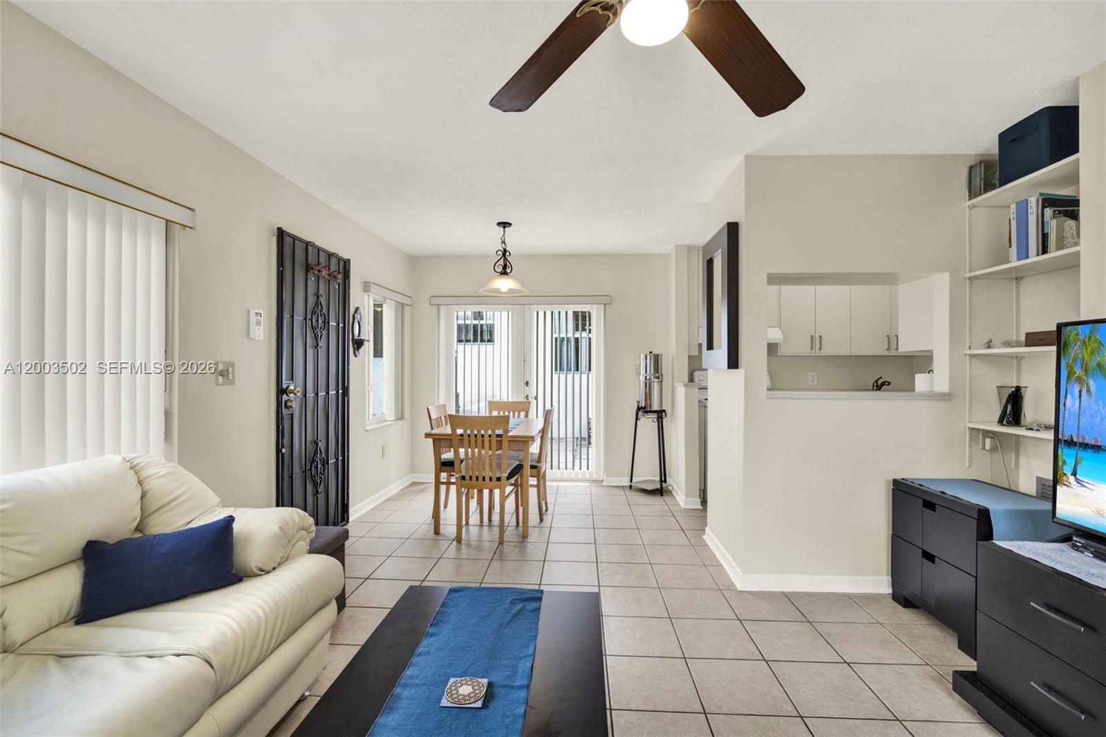 5701 Southwest 50th Terrace Miami, FL 33155 - Photo 29 of 46 a living room with furniture and a table